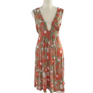 Lux floral print flowy dress with deep V-neck, sleeveless. Size medium